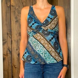 Cute bohemian styled top with a tie in the back.